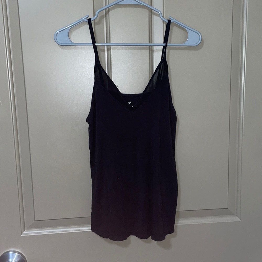 Black flowy tank top with mesh lining